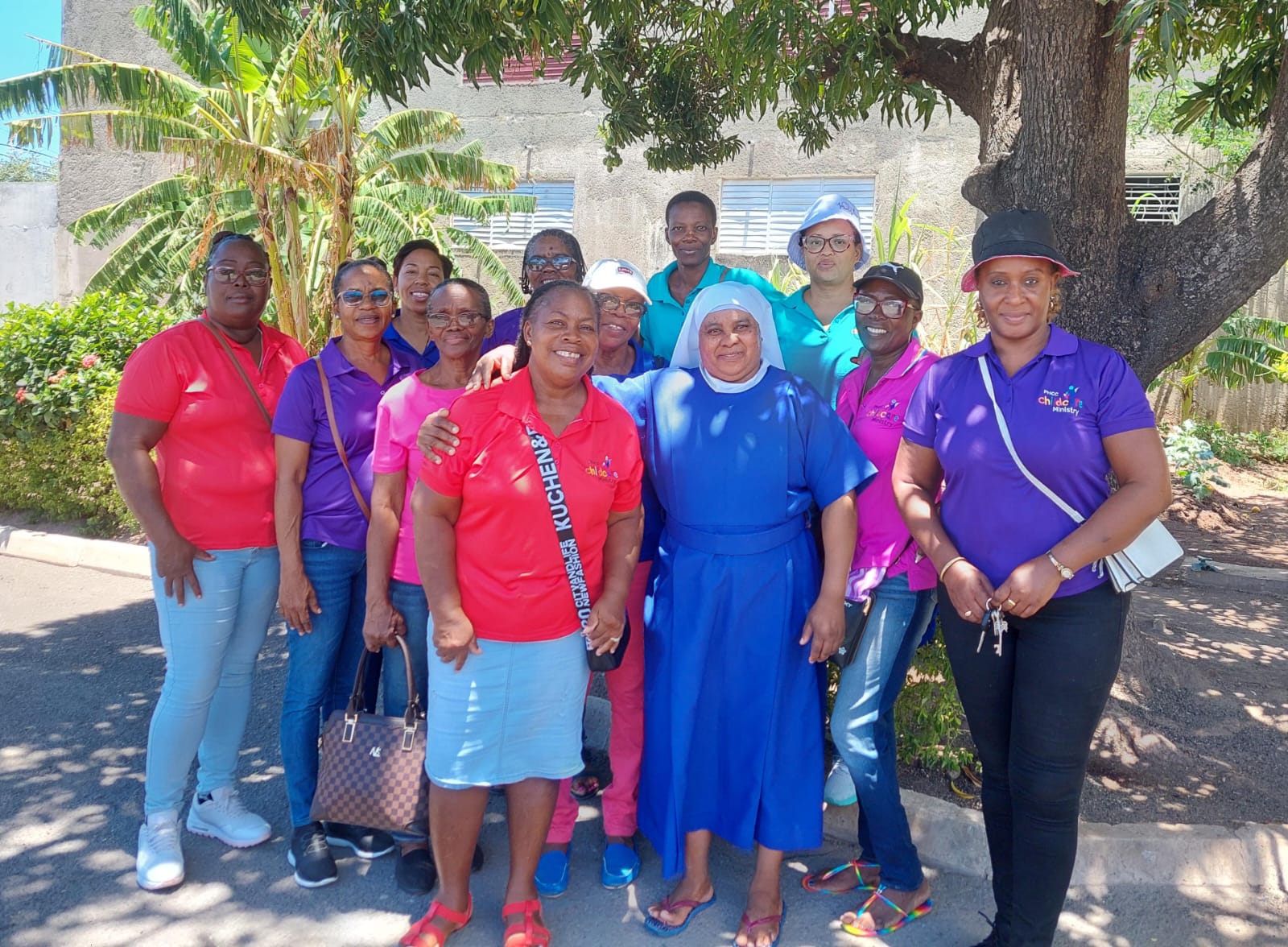 Childcare Ministry volunteers gathered during a community outreach visit