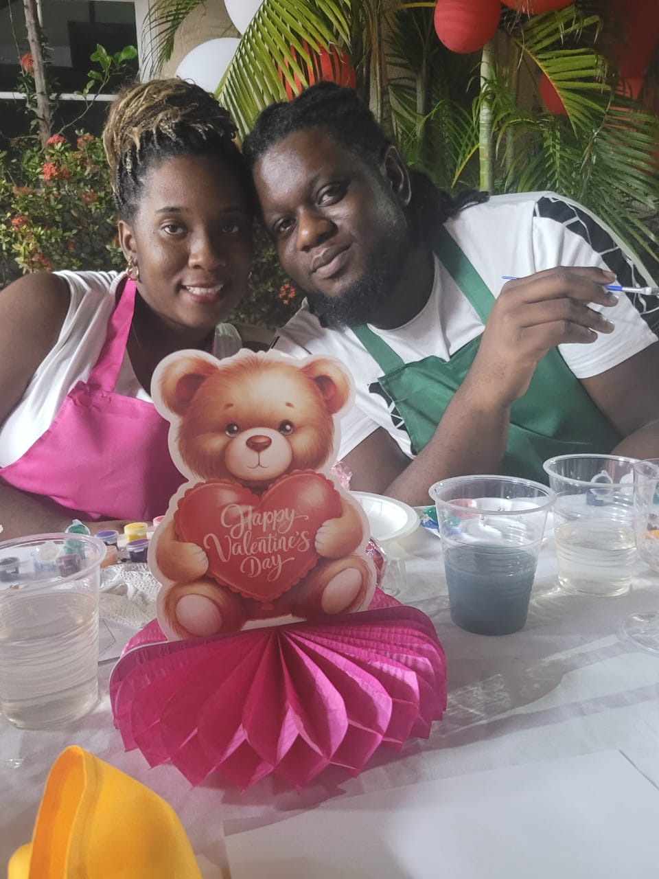 A couple enjoying the Marriage Ministry painting activity together