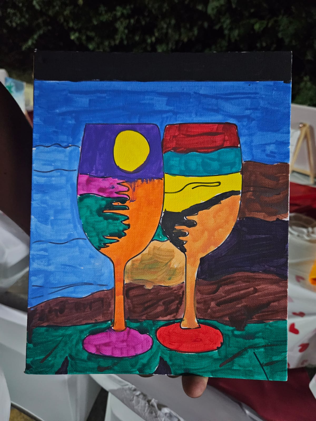 Colourful painting of two glasses created at the couples' art gathering