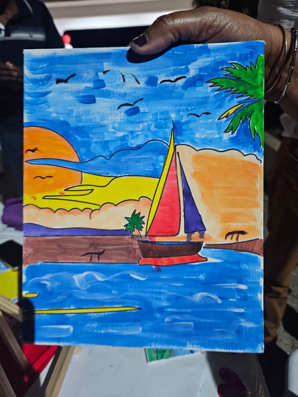 Colourful sailboat painting created during the Marriage Ministry event