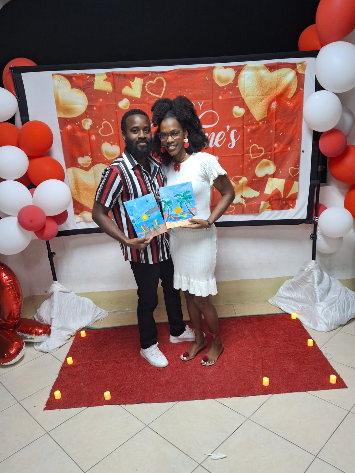 A young couple sharing their artwork at the Marriage Ministry gathering