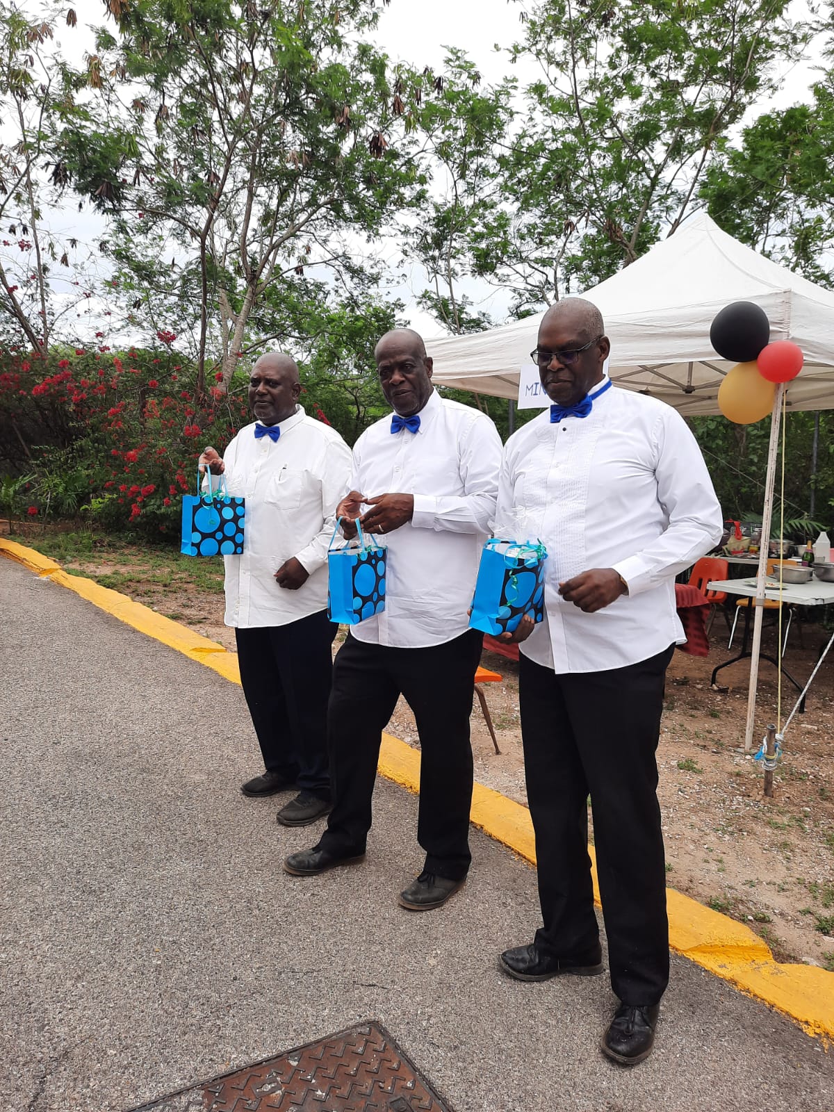 Men dressed for a ministry community showcase