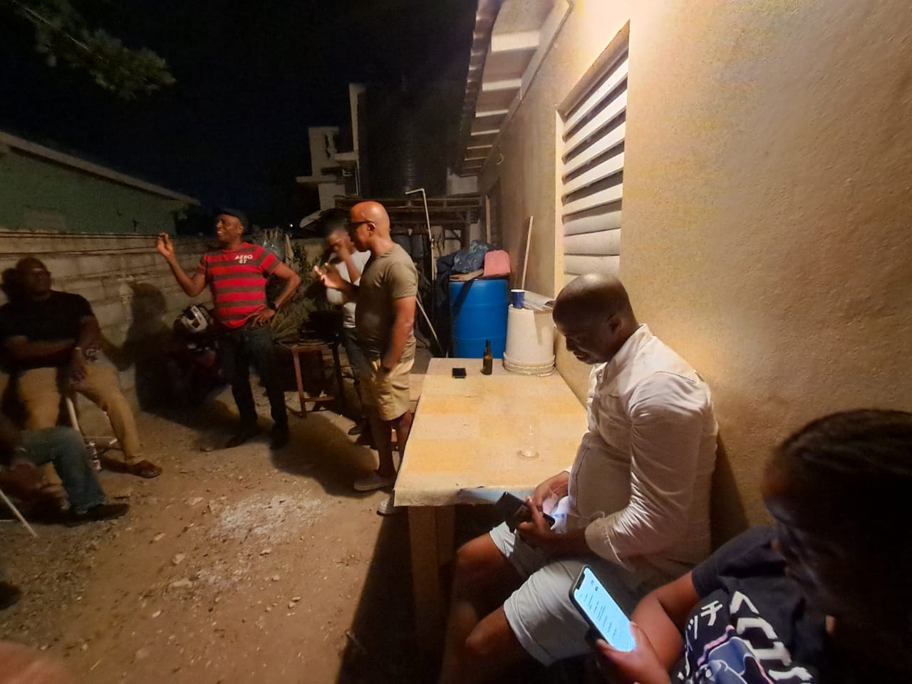 Men spending time together at a relaxed evening gathering
