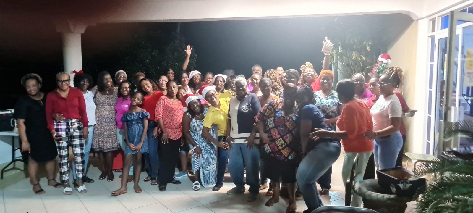 Women gathered for a Christmas fellowship group photo