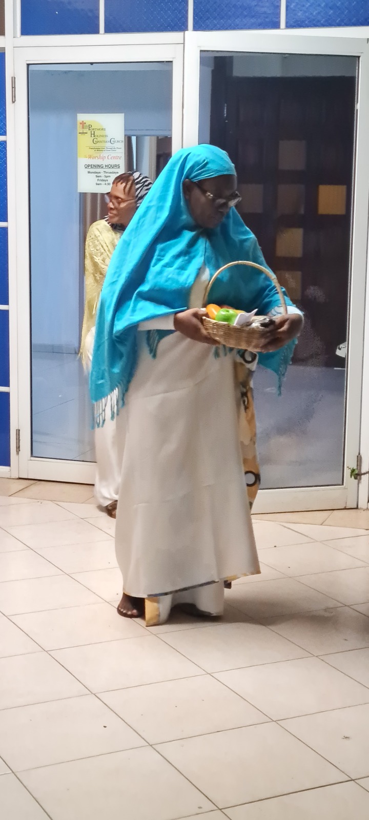 Woman participating in a Christmas fellowship presentation