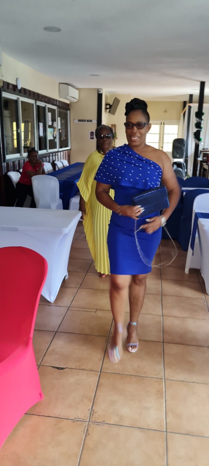 Woman arriving for a Women's Ministry fellowship event